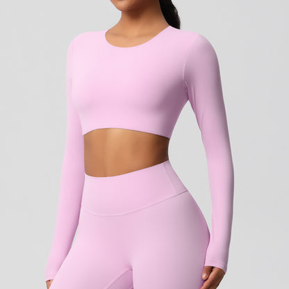 Brushed long-sleeved yoga top with padded bra and tight fit.
