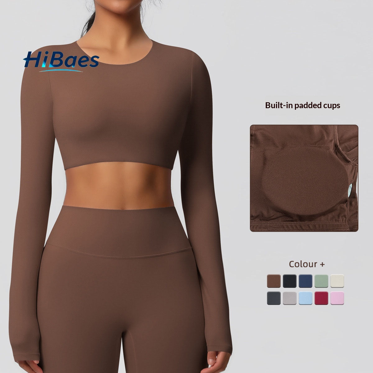 Brushed long-sleeved yoga top with padded bra and tight fit.