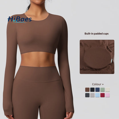 Brushed long-sleeved yoga top with padded bra and tight fit.
