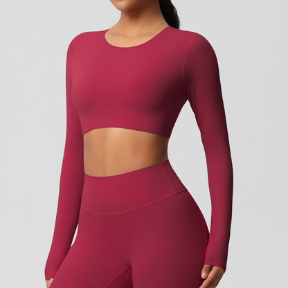 Brushed long-sleeved yoga top with padded bra and tight fit.