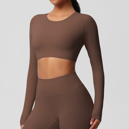 Brushed long-sleeved yoga top with padded bra and tight fit.