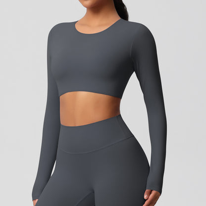 Brushed long-sleeved yoga top with padded bra and tight fit.