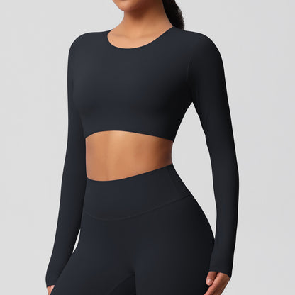 Brushed long-sleeved yoga top with padded bra and tight fit.